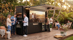 OLEA 38 Black outdoor kitchen pod in an Australian garden