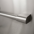 Brushed stainless steel bar handle detail on the drawer front
