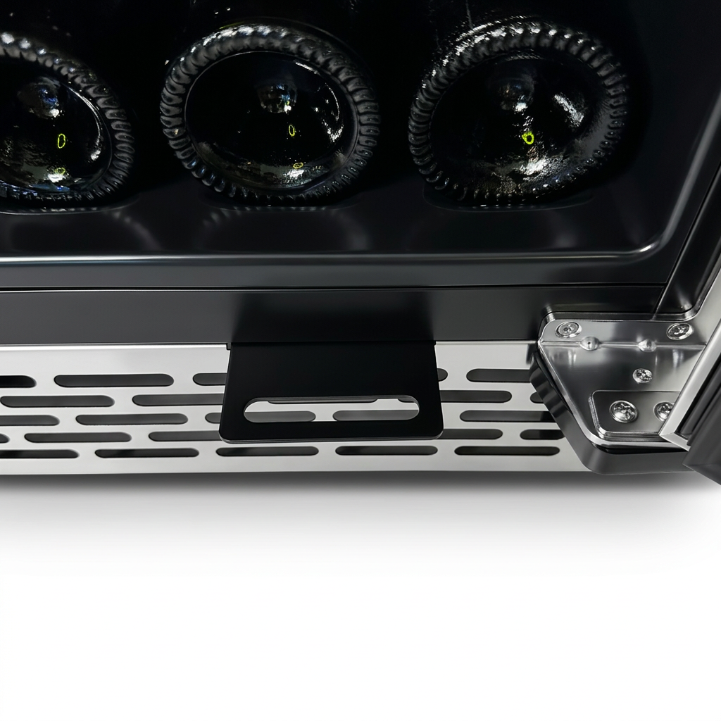 Wine bottles resting on the lower shelf above the stainless base vent